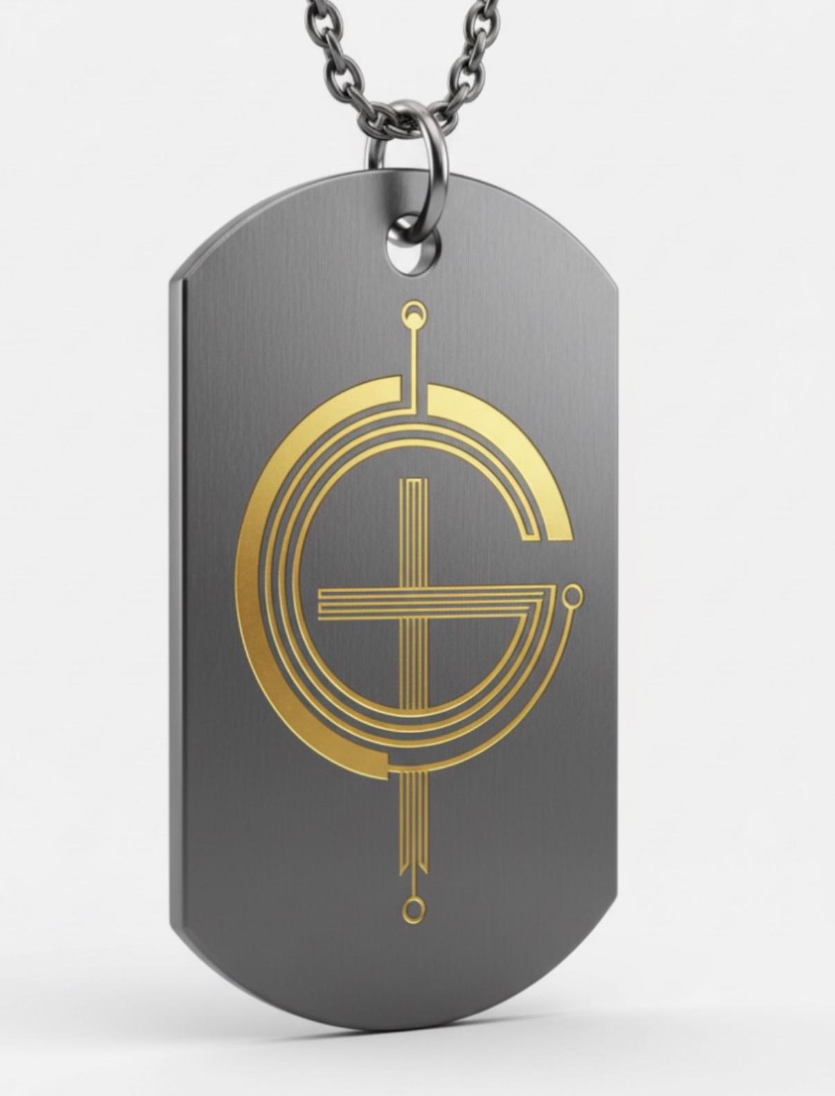 GodTags Signature Tag — brushed gunmetal with gold emblem